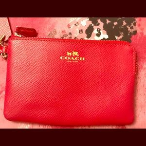 Red coach wristlets .